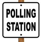 polling station sign over white background 54075022