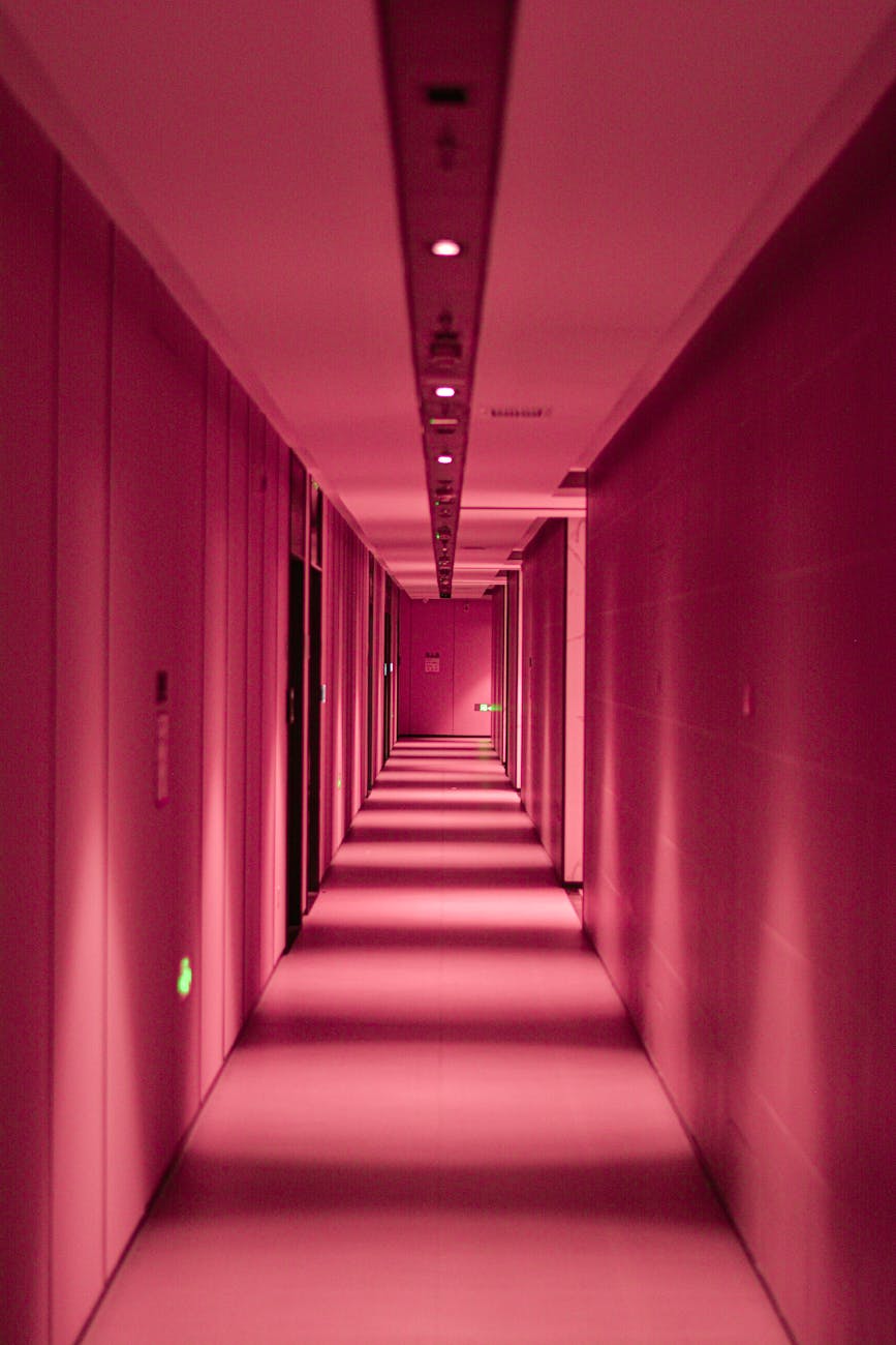 moody pink corridor with perspective depth