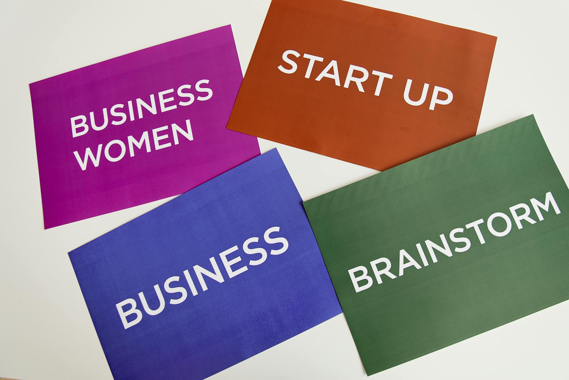 close up shot of papers with business related words