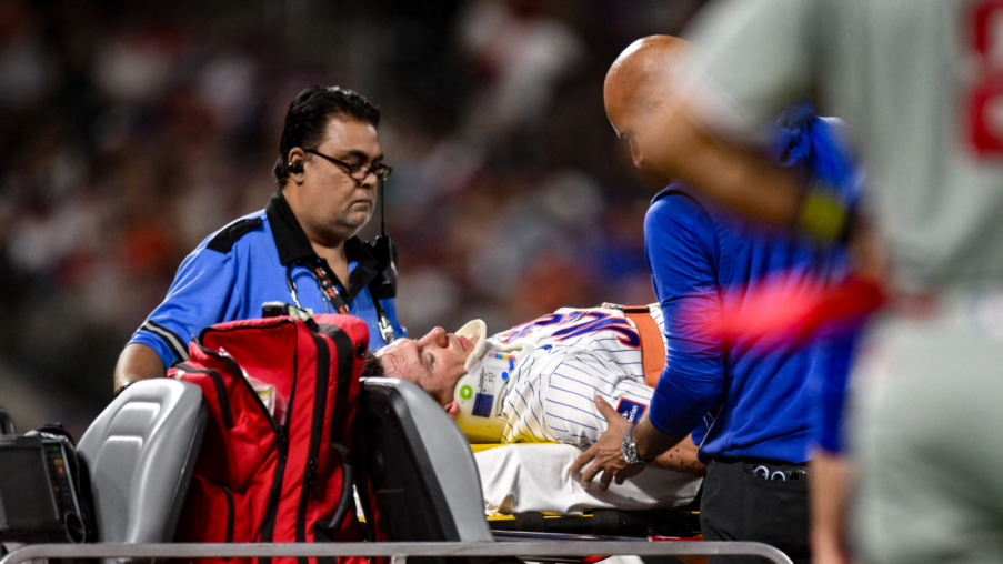 mets jared young carted off field after colliding with nolan mclean during play at first base AevwJb