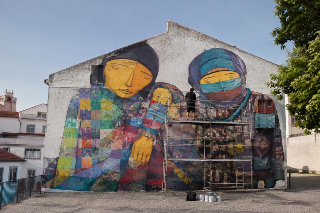 OSGEMEOS Complete a Mural in Lisbon with Underdogs 2 osgemeos complete a mural in lisbon with underdogs eUKOIA